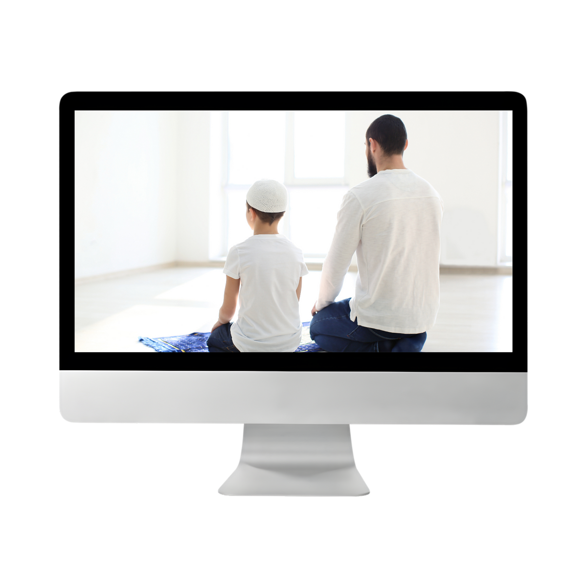 Computer monitor showing a father and son on a prayer mat, representing Dini Ilm's online Basic Islamic Course for kids and beginners.